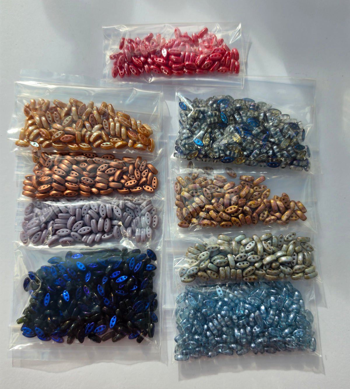 Czech Glass Three-Hole Oval Beads – Mixed Colours & Finishes – 9 Bags