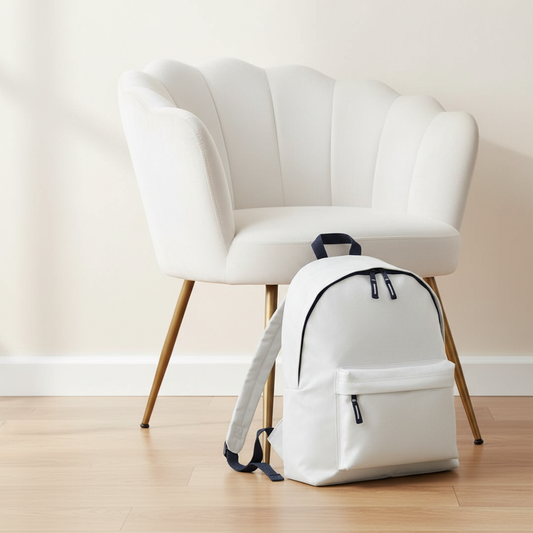 Junior Fashion Backpack next to white velvet chair