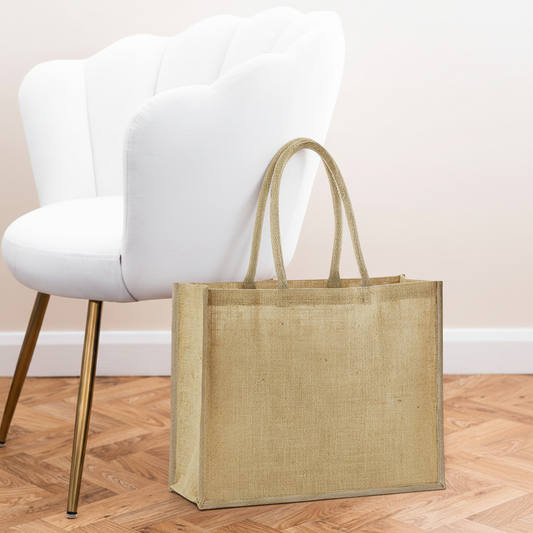 Jute Classic Shopper (natural) next to white velvet chair