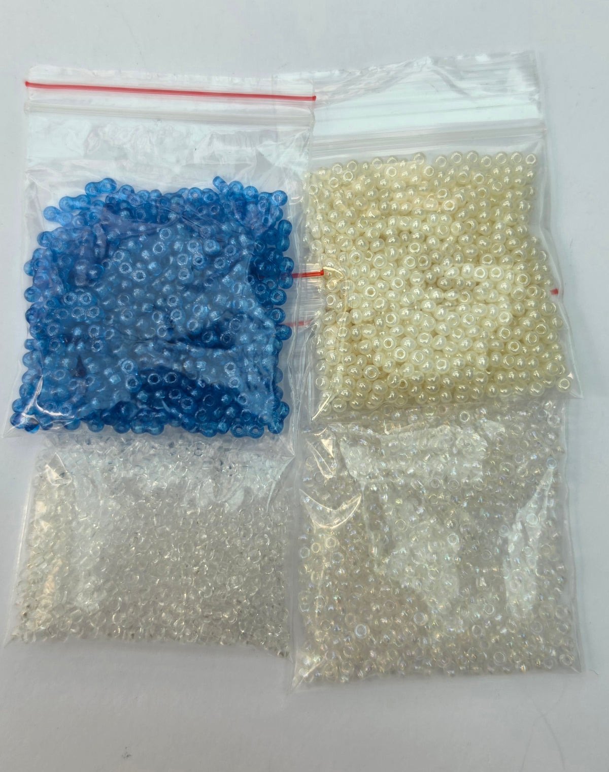 Glass Seed Beads – Blue, Pearl & Clear Mix – 4 Bags